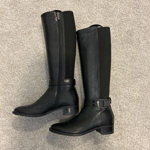 Tall black boots